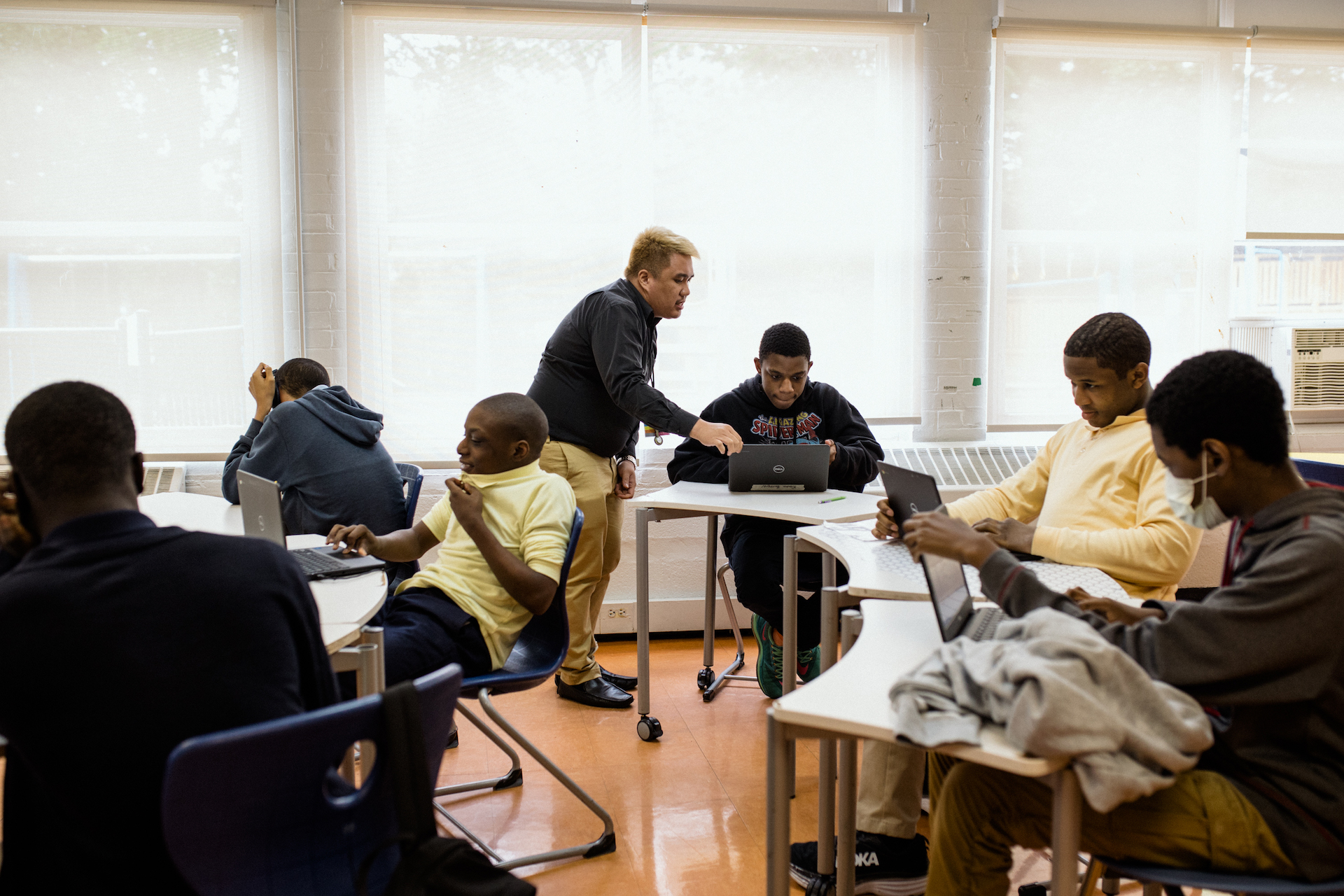 Cruz teaches math to his 10th grade class.