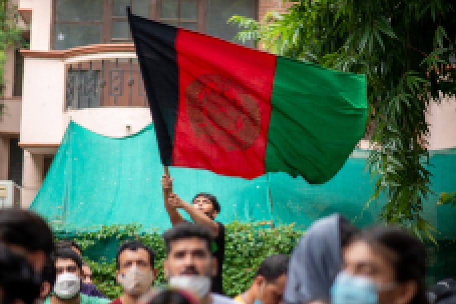 Afghan boy with flag