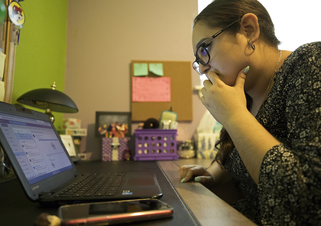 Maytee on her laptop