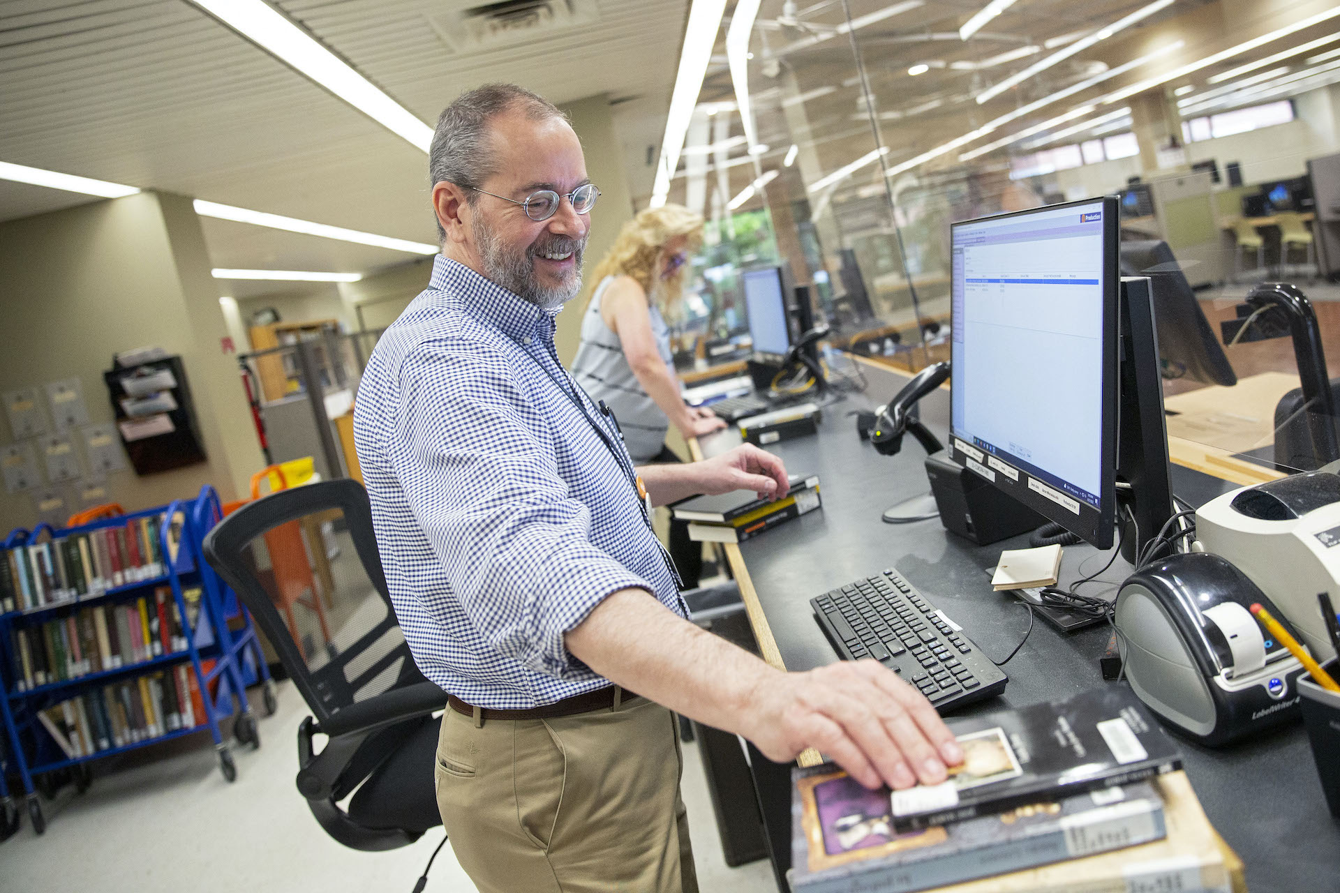 Todd Burks working at the library