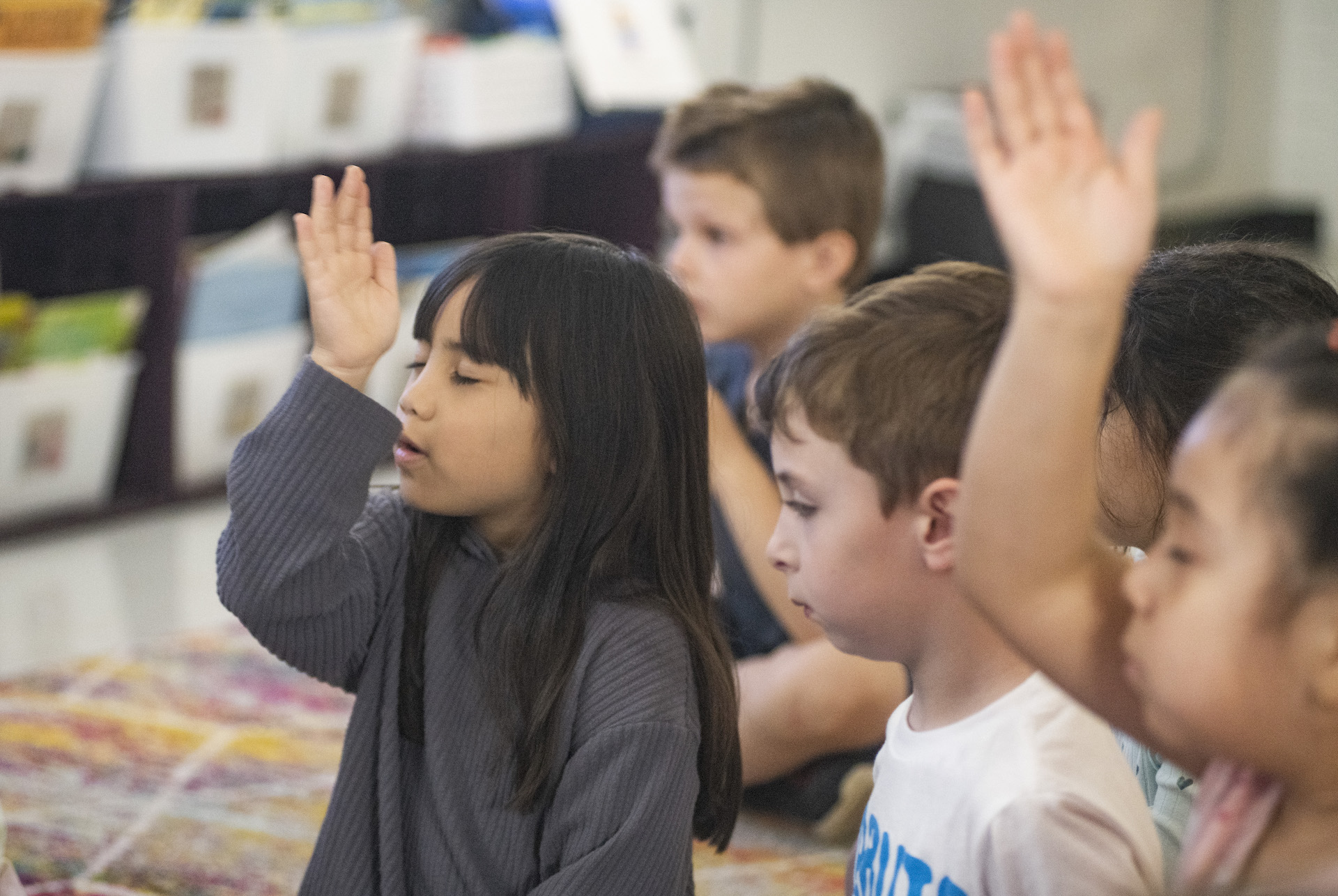 Girl focusing with eyes closed