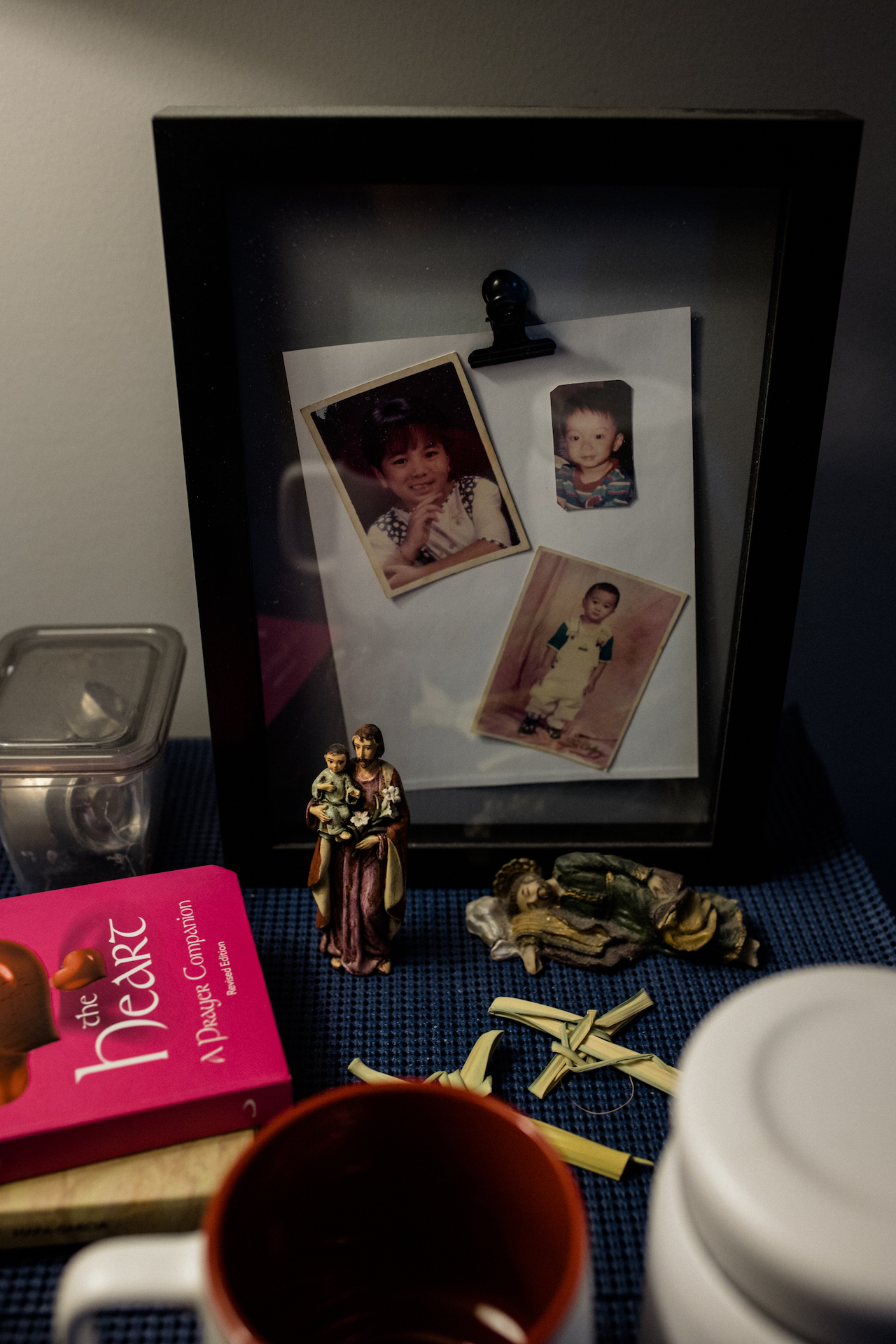 Photographs of Cruz and his family that he keeps at home.