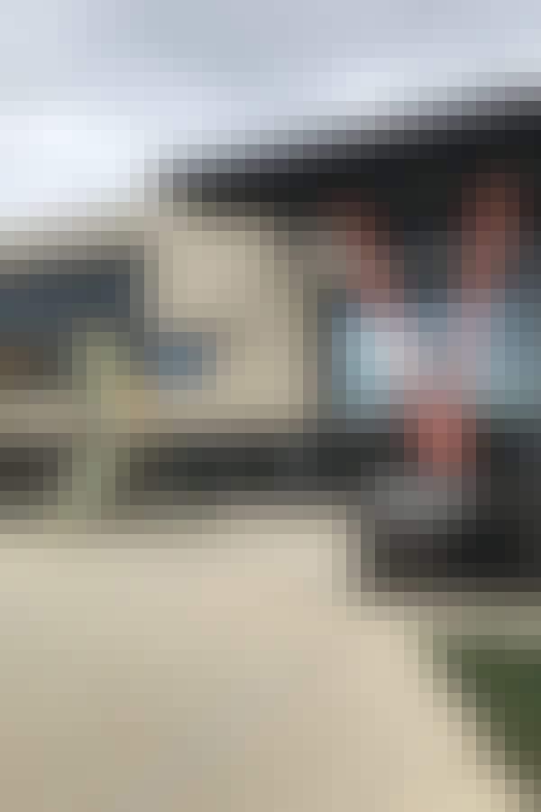 Lewis Ferebee, chancellor of District of Columbia Public Schools, visits a math class. Photo by Nadia Tamez-Robledo for EdSurge.